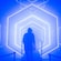 A person walks through an indoor maze on an illuminated path with stairs